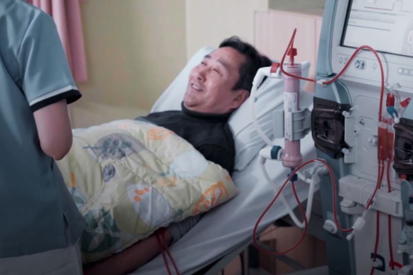 patient receiving in-centre haemodialysis treatment with a nurse