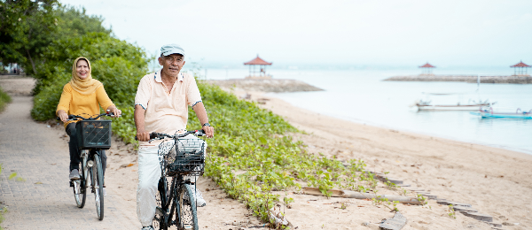 Man and woman riding bicycles